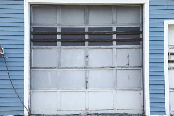 When to Call a Pro for Garage Door Malfunctions